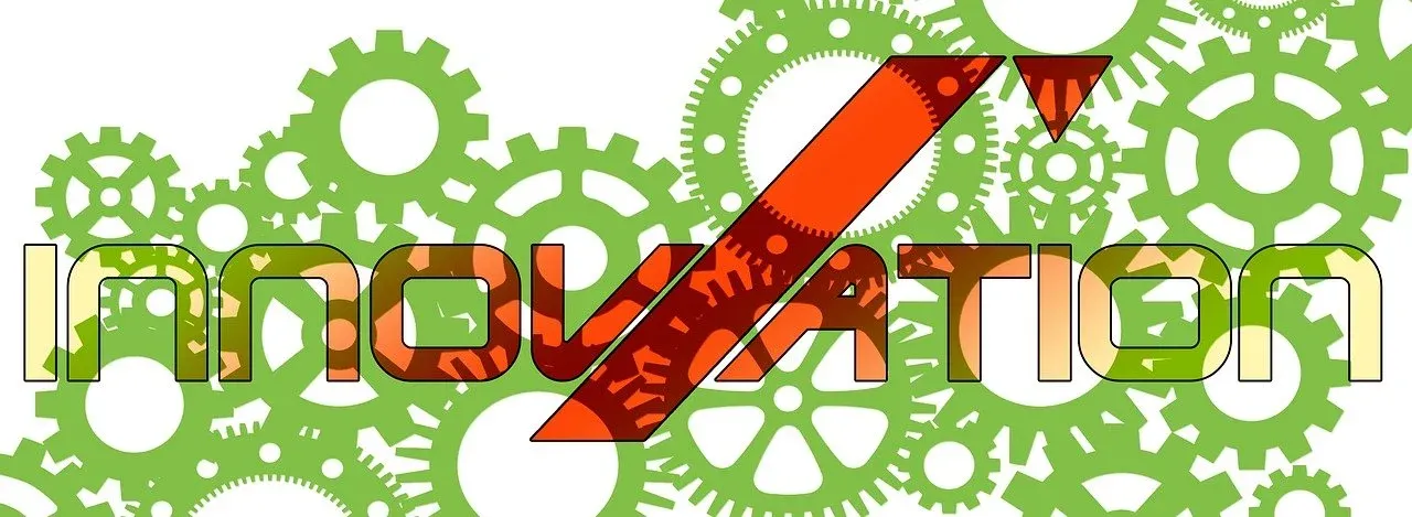 The word "Innovation" over a field of interlocking green gears, with a pencil drawn as an upward arrow through the letters.